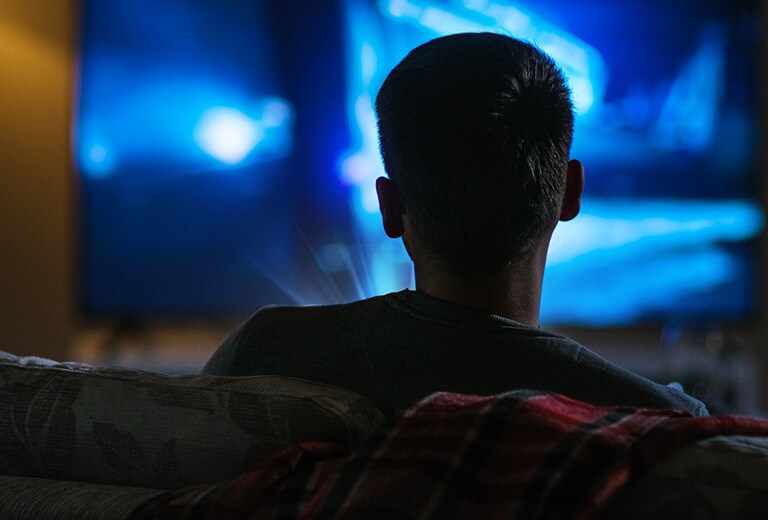 Watching a movie in a narrow room.