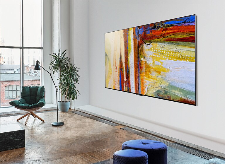 An image of LG OLED G3 showing a colorful abstract artwork in a bright and vivid room.