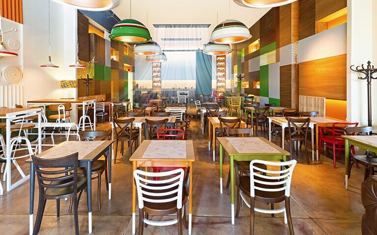 An image of a food court at a shopping mall with air conditioning on.