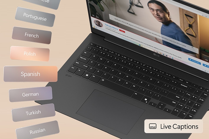 A live broadcast is displayed on the laptop screen, showing a man speaking. As he talks, subtitles with automatic translations appear at the bottom of the screen.