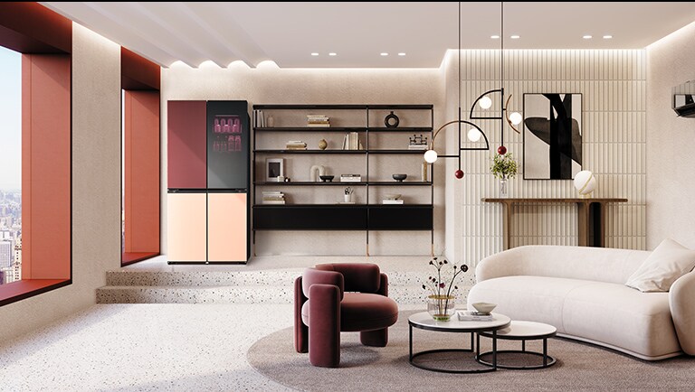 In the image of a modern living room in orange tones, a refrigerator is placed on the left.