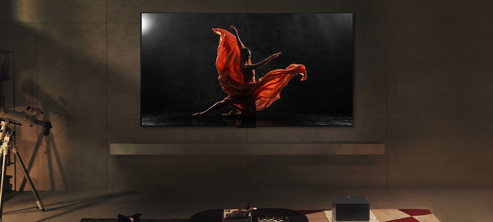 LG SIGNATURE OLED M4 and LG Soundbar in a modern living space in nighttime. The screen image of a dancer on a dark stage is displayed with the ideal brightness levels.