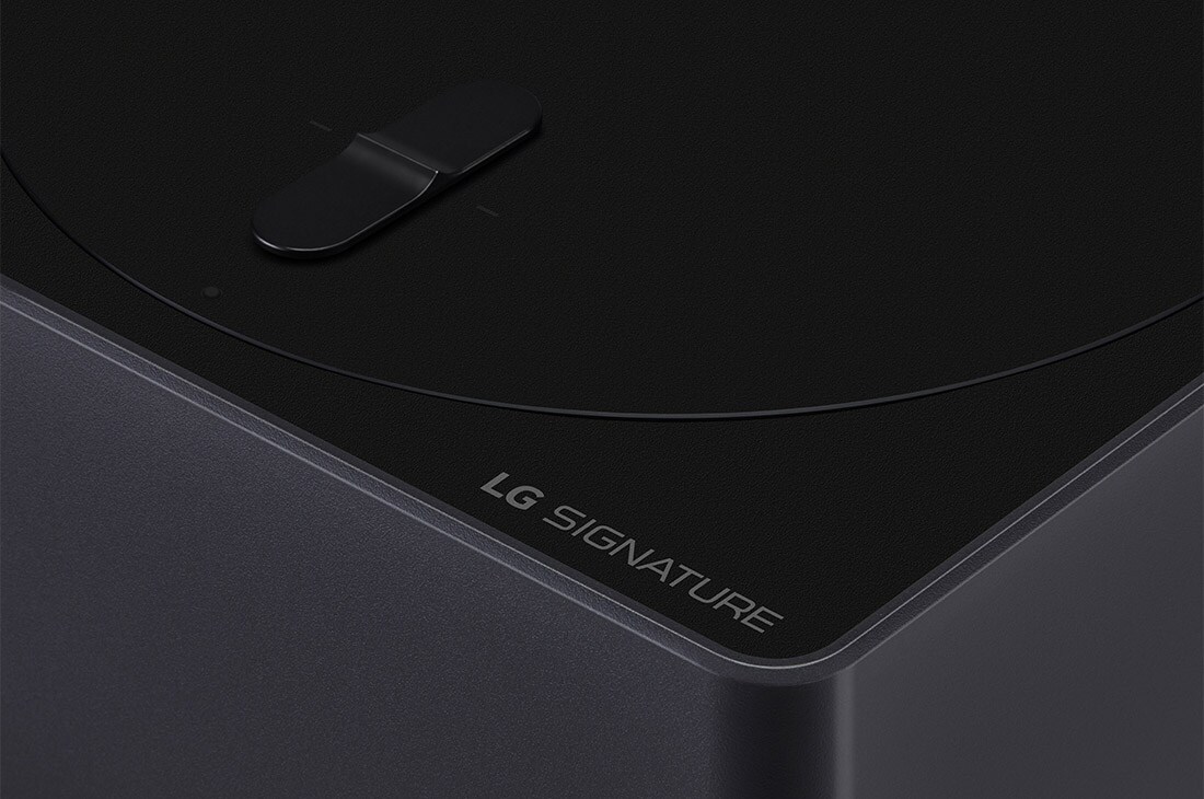 Slightly-angled close-up of the Zero Connect Box with the LG OLED logo on the edge