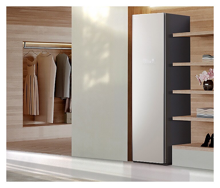 It shows mist beige color LG Styler Objet Collection placed in the dressing room.