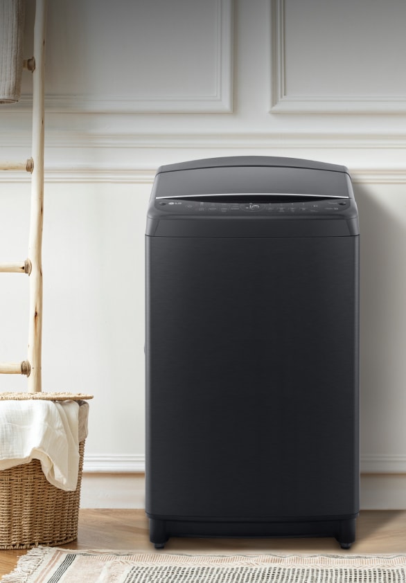 洗衣房中的 LG 直立式洗衣機	