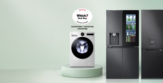 Award winning LG Washing Machine on a podium, next to 2 LG fridges