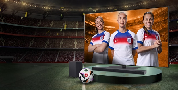 lg oled tv on a pedestal with 3 female football players as a screenfill with promo message to buy a tv and receive a free soundbar worth up to £999