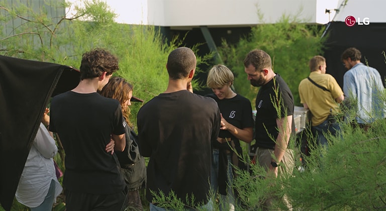 People gathered in the grass