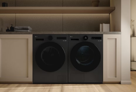 A video of a black LG laundry solution appliance installed in various modern home interiors.