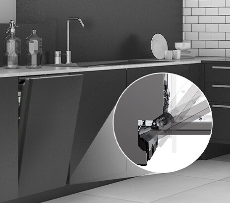 The stainless steel interior of the dishwasher.	