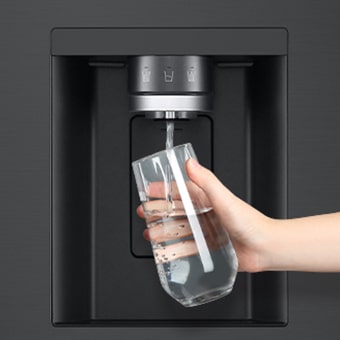 Refrigerator in front of rising arrows and piling coins