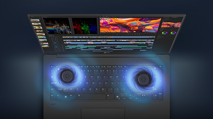 A laptop with a video editing interface on its screen, showcasing dual cooling fans emitting blue airflow visuals, emphasising advanced cooling technology.	