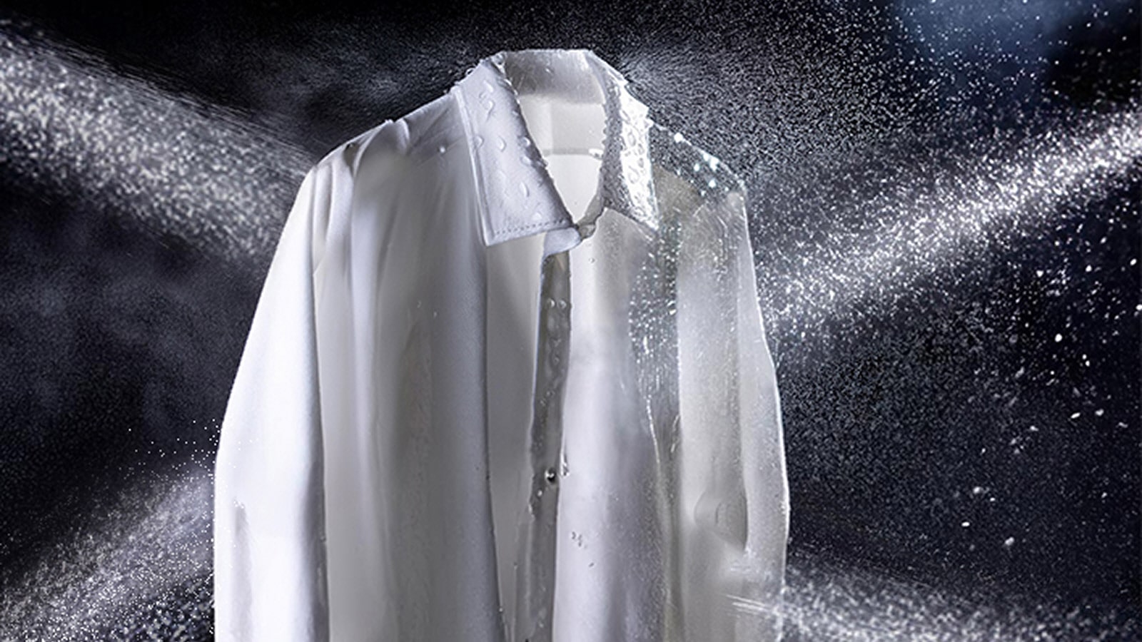 Image of a white shirts being splashed with water from 4 different directions.