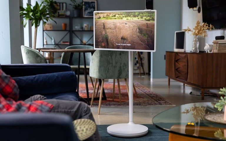 A versatile LG StanbyME TV stand in a cozy living room setting, highlighting portability and modern design for adaptable viewing.