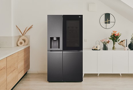 Refrigerator placed in a kitchen	