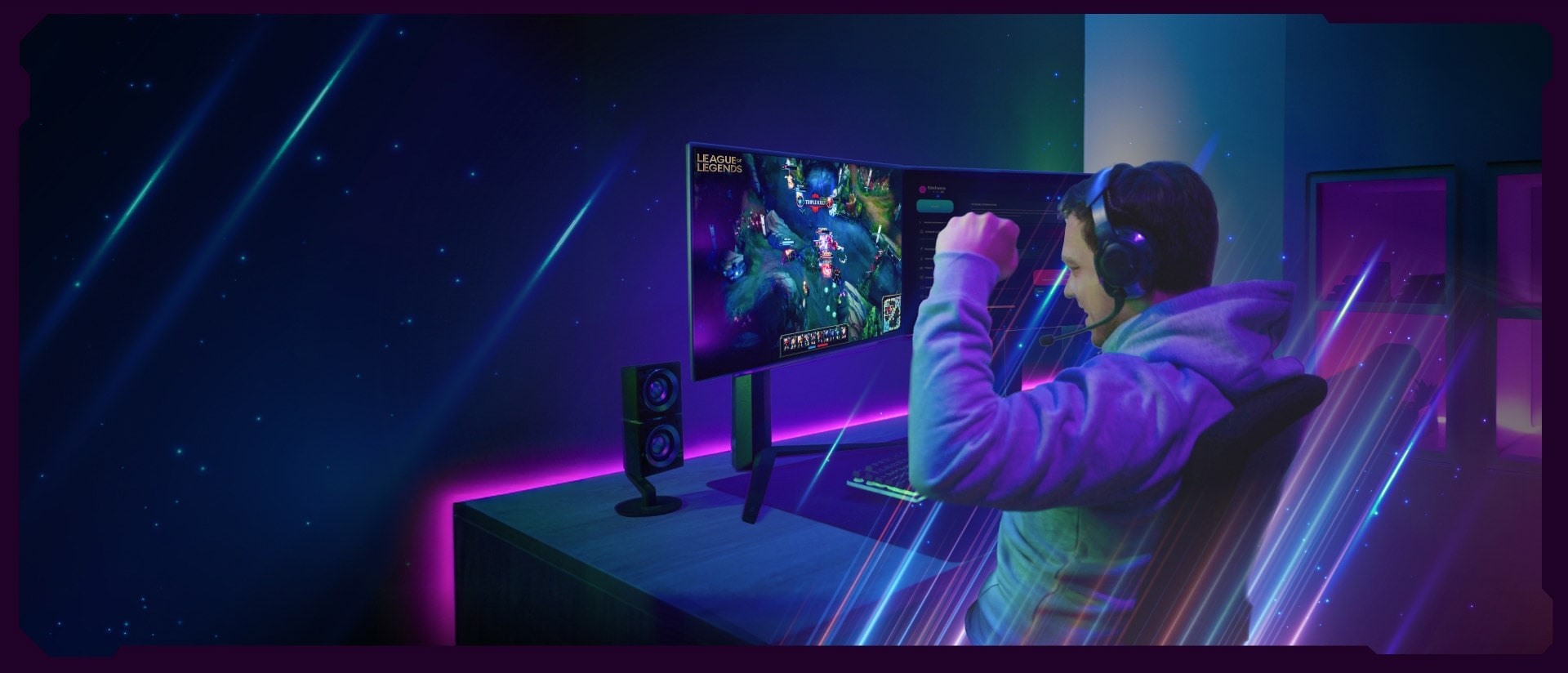 A gamer cheering in front of a dual-monitor setup with colorful LED lighting.