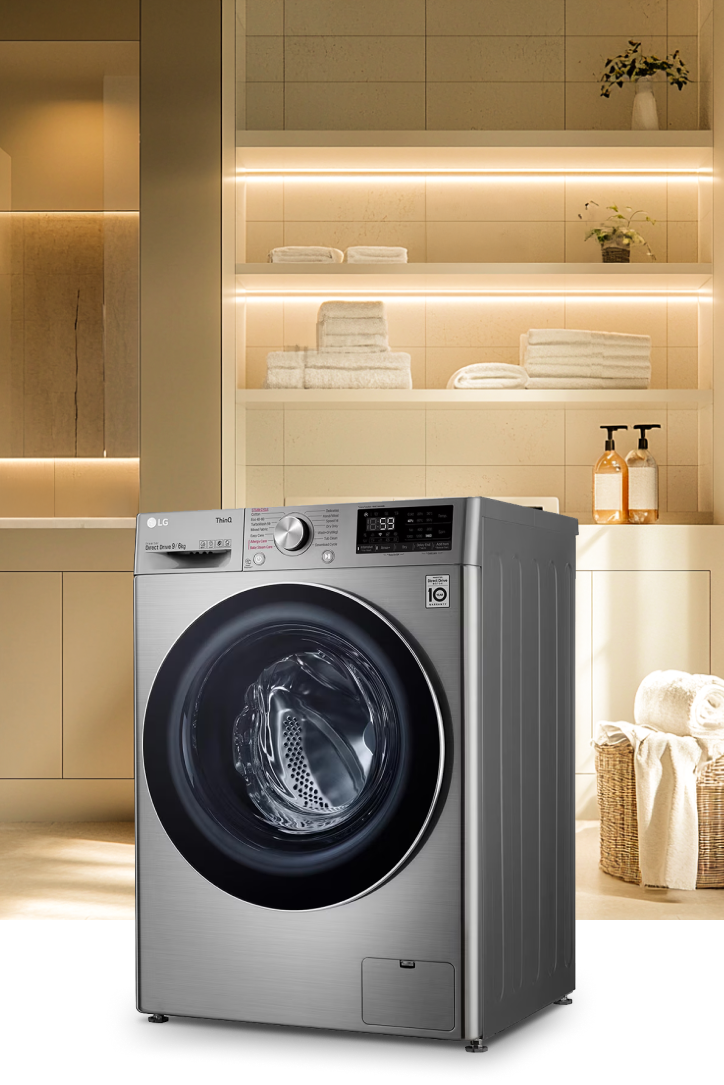 An LG washing machine is set up in a neat laundry room.