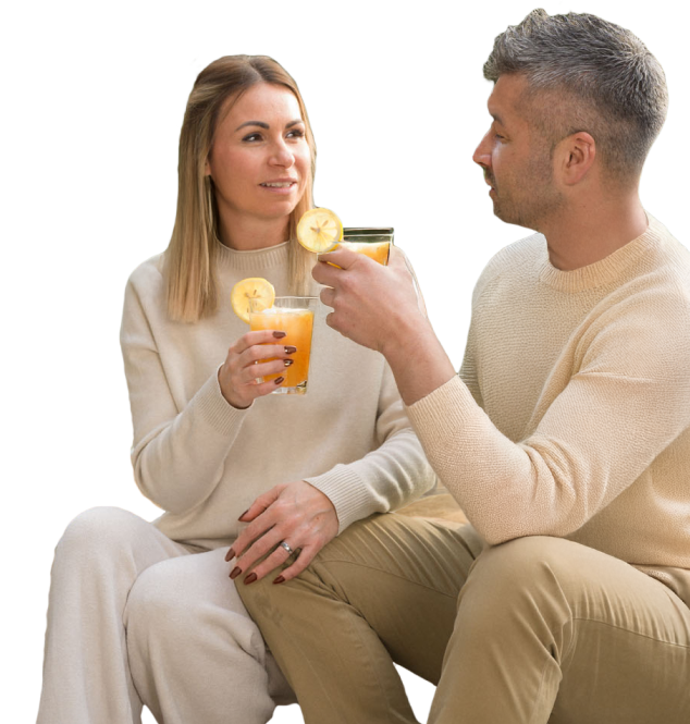 a man and woman enjoying drinks together.