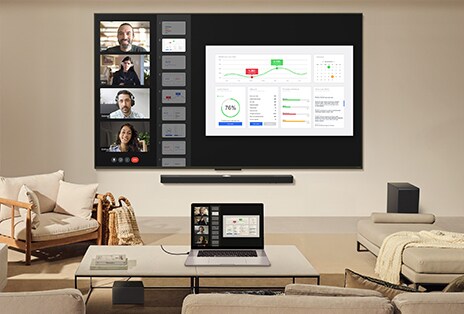 TV LG treo tường phía trên LG Soundbar bên dưới. Zero Connect Box được bố trí tinh tế dưới bàn trà.