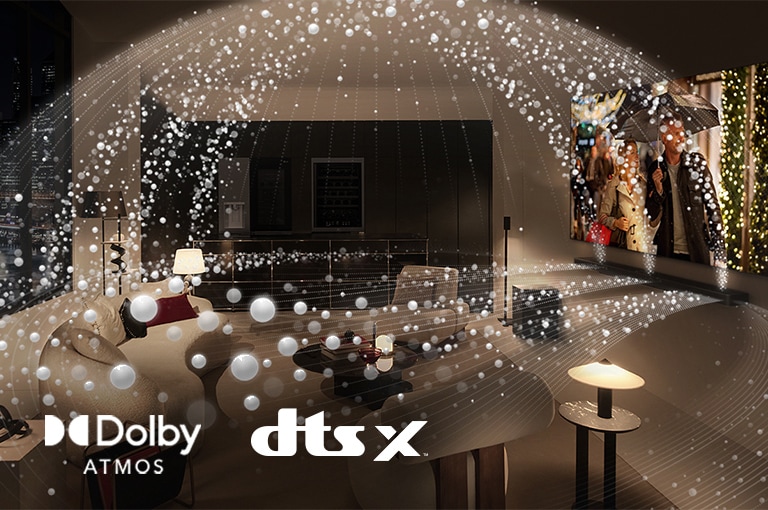 A movie plays on an LG OLED TV and LG Soundbar in a modern city apartment in a side angle view. White beads depicting sound waves project upwards and downwards from the Soundbar and TV, creating a dome of sound in the space.  Dolby Atmos logo DTS X logo