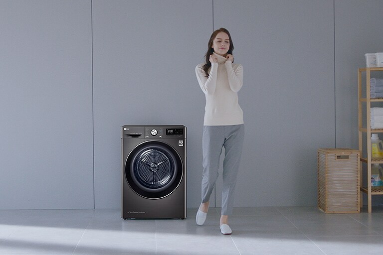 Woman standing near LG dryer