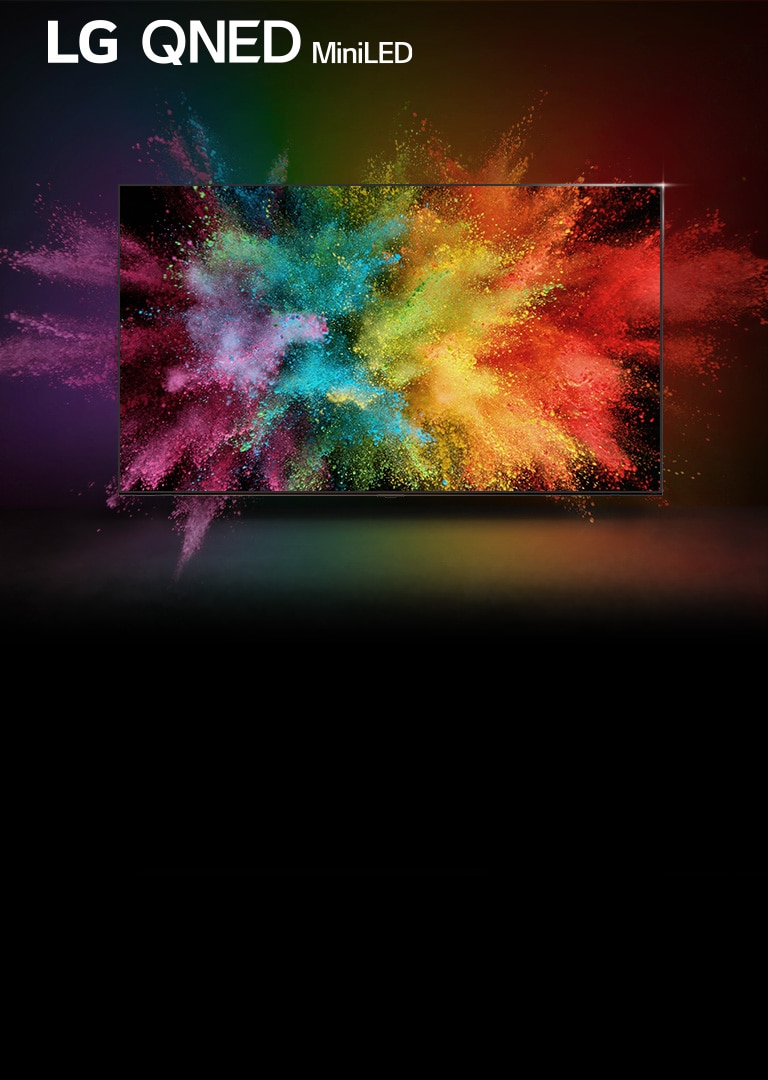 An LG QNED in a dark room. Dyed powders create an explosion of rainbow colors on the TV.