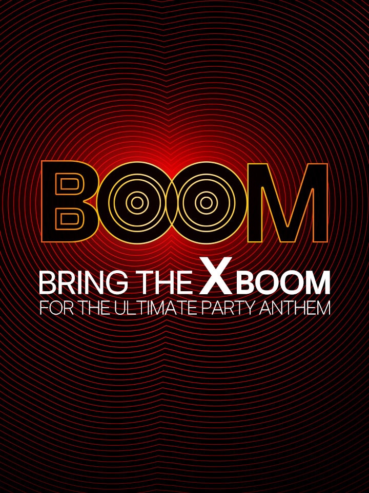 The word "BOOM" is written against the red light. The text is modified to emphasize its powerful sound. Below "BOOM," the phrase "BRING THE XBOOM FOR THE ULTIMATE PARTY ANTHEM" is shown.