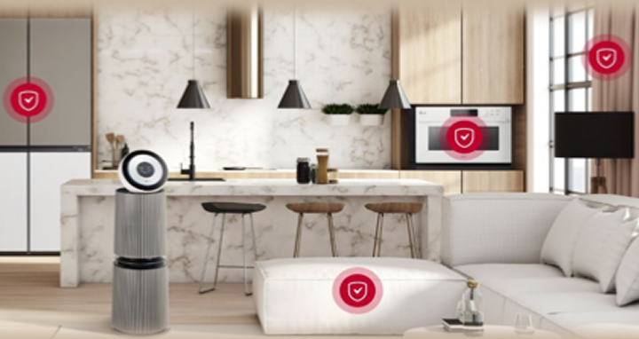 Modern kitchen and living room interior with multiple appliances, each marked with red shield icons highlighting antimicrobial protection features.