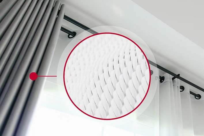 Curtains with a magnified view highlighting the texture of textiles and fibers.