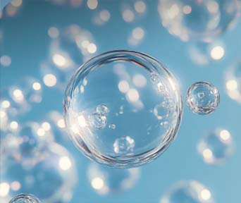 Transparent bubble floating against a blue background	