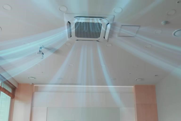 The ceiling-mounted LG Dual Vane unit delivers airflow into the room through each of its vanes.