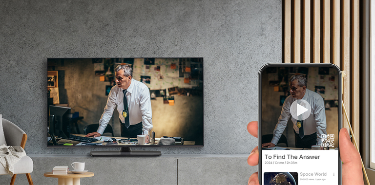 A hotel guest is using OTT services by pairing their smartphone with the in-room TV through QR code login.