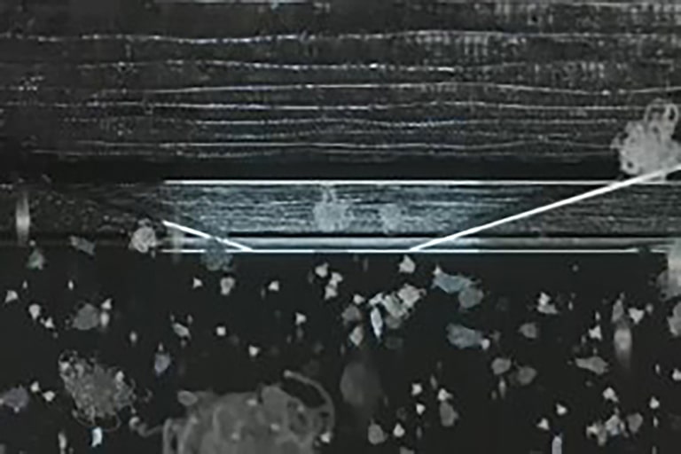 Fine dust particles penetrate the pre-filter's narrow structure from the bottom.