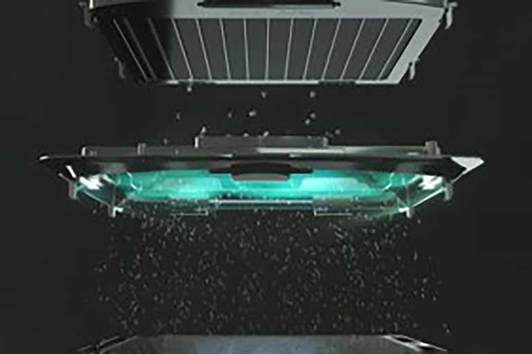 Small dust particles traverse the top-located electrification zone, illuminated in blue.