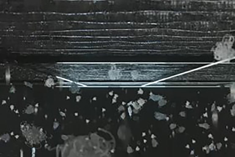 Fine dust particles penetrate the pre-filter's narrow structure from the bottom.