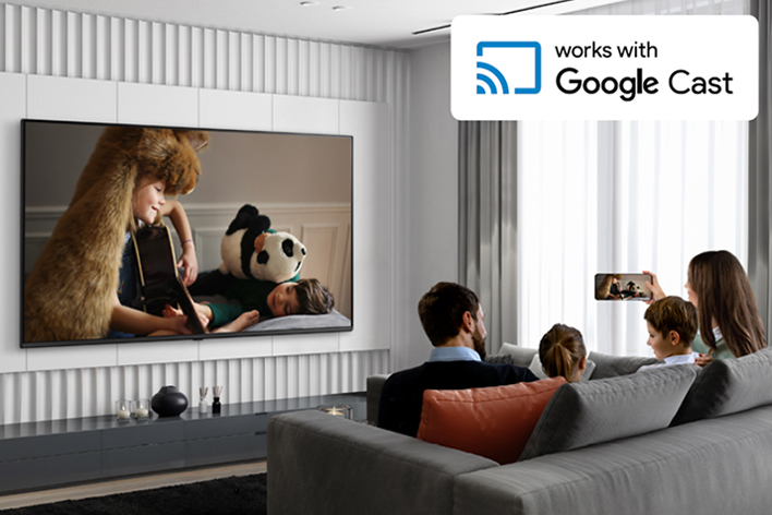 This image shows hotel guests streaming content from their smartphone to the in-room hotel TV.