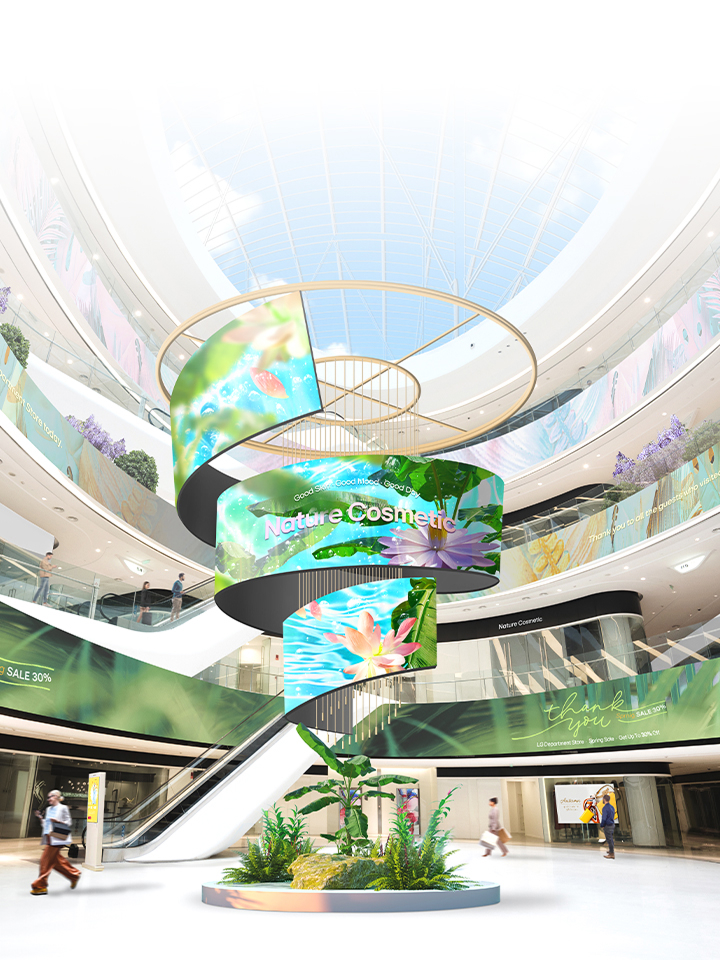 LG LED Signage installed in a shopping mall with curved displays showcasing vivid nature visuals. LG indoor and outdoor LED signage solutions creating eye-catching experiences and premium advertising performance.