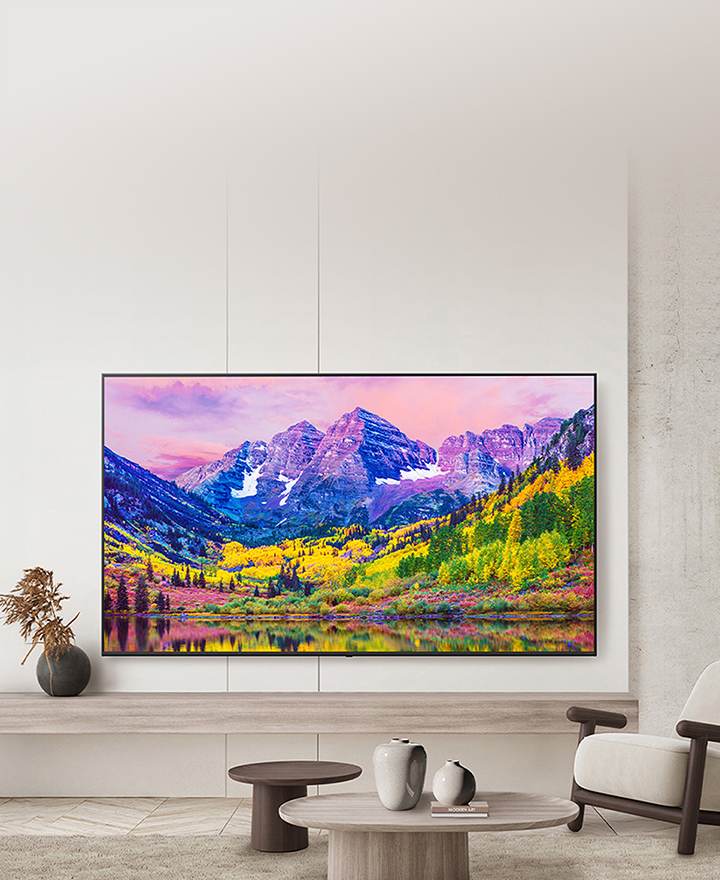 LG Commercial TV displaying vivid street scene with classic car, designed for hotel and healthcare environments. LG hospitality and healthcare TV solutions offering customized guest experiences with vibrant picture quality.
