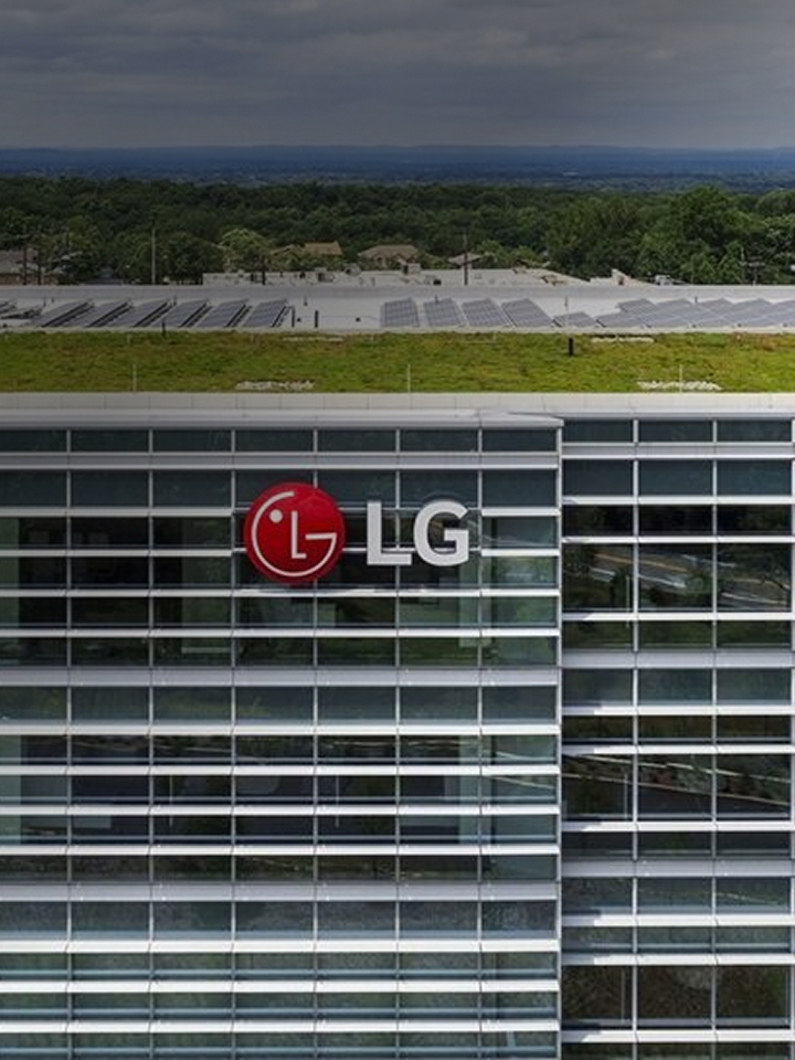 LG Lifecycle management building exterior with rooftop solar panels and green roof