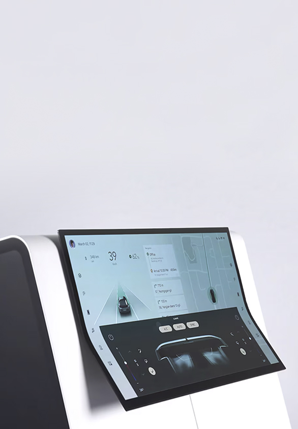 Close-up of a digital car head unit with a large interactive screen, representing intelligence behind the wheel.