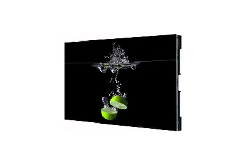 'A digital display showing a vivid image of green lime halves splashing into water against a black background.