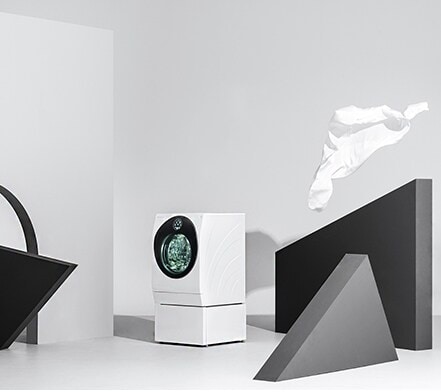 lg signature washing machine is displayed right in the middle of the picture with some triangle and arch structures around it