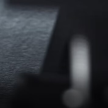 A close up shot of steel with the text 'Scratch-resistant textured finish.'