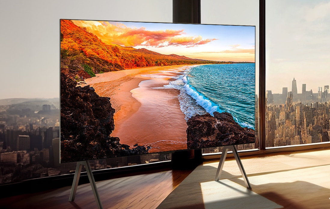 LG SIGNATURE OLED M with a beach on screen.