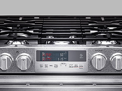 close shot of LG SIGNATURE Oven Range gas cooktop operation part