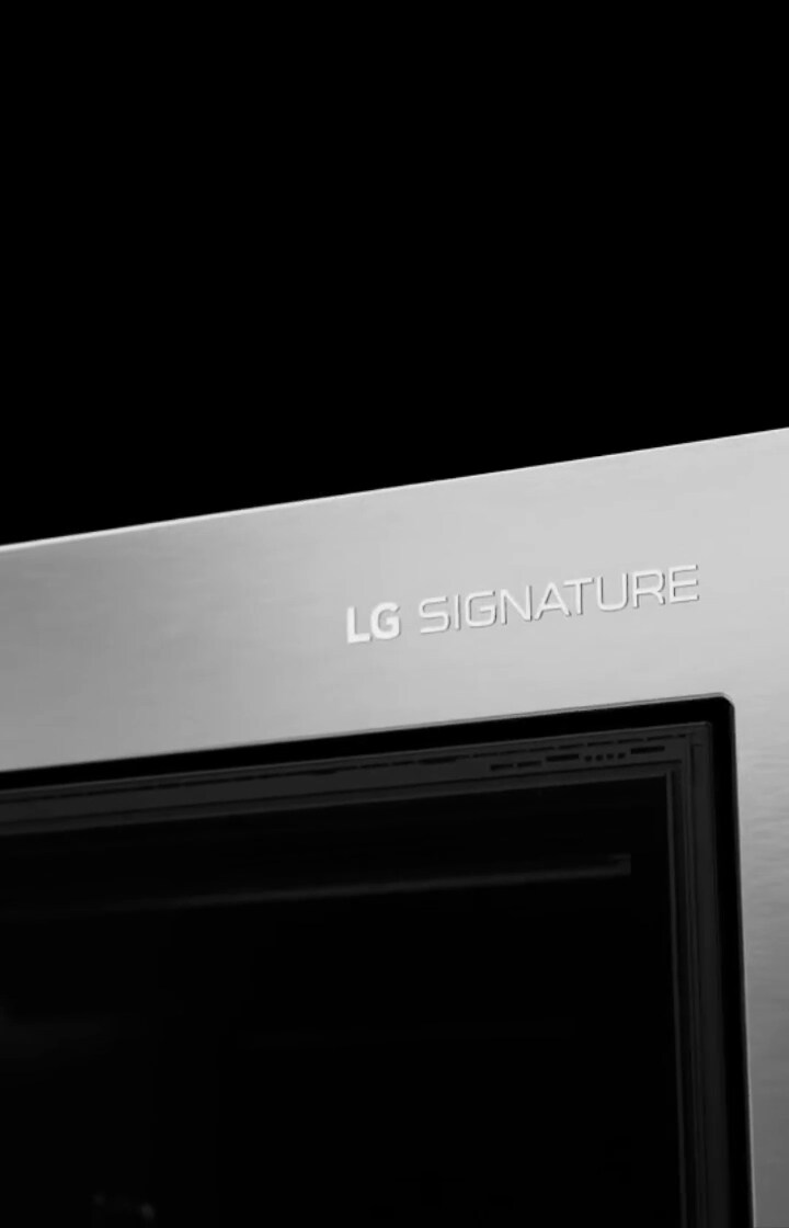 Close up image of the top left hand corner of the LG  SIGNATURE Refrigerator, clearly showing the LG Signature logo engraving.