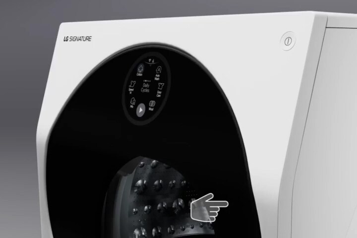 Side view of LG SIGNATURE Washing Machine with a push button