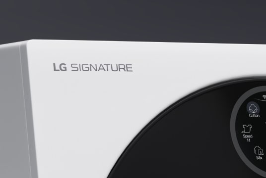 Close up image of the top left hand corner of the LG Signature Washing Machine, clearly showing the LG Signature logo engraving.