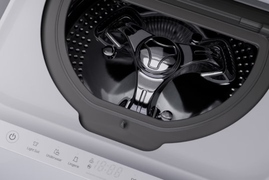 Close up image of the top section of the LG Signature Washing Machine door and the Quick Circle Display panel.