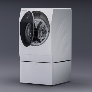 Image showing the full LG Signature Washing Machine, taken from the front, stood against a dark backdrop.